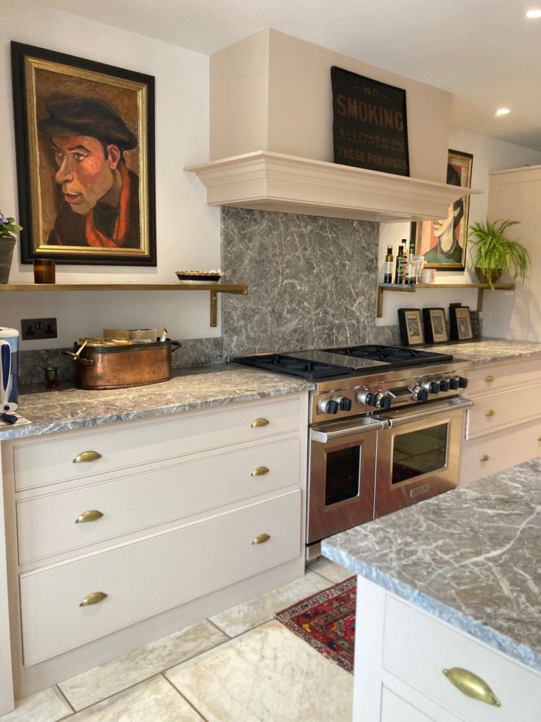 The Architectural Forum reclaimed marble worktops and floor