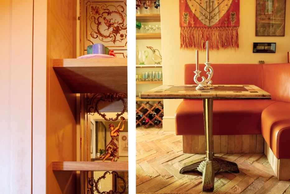 Art Deco bistro table, banquette orange seat, French bistro mirror and reclaimed iroko shelves